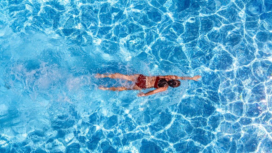 Active girl in swimming pool