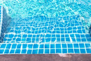 Stair concrete with blue stripe tile to Swimming Pool, Blue tile with white stripe line