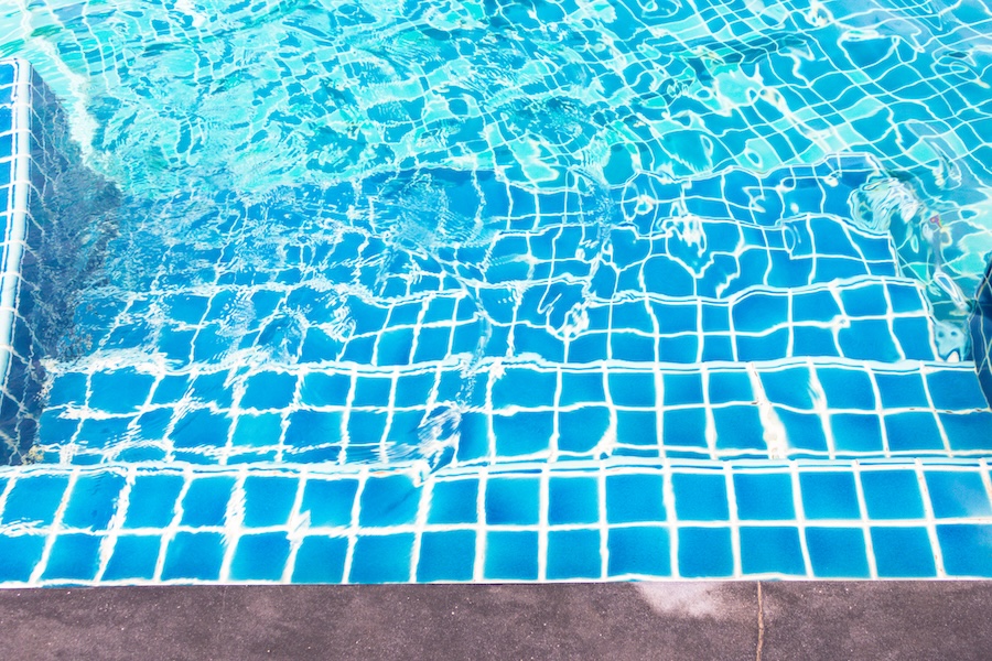 Stair concrete with blue stripe tile to Swimming Pool, Blue tile with white stripe line